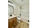 Bathroom featuring a tub and wood grain vanity at 613 Granite Ave, Gastonia, NC 28052