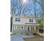 Charming two-story home featuring a cozy front porch, neutral siding, and well-manicured front yard at 613 Granite Ave, Gastonia, NC 28052