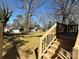 Wooden stairs lead to a spacious backyard at 620 Granite Ave, Gastonia, NC 28052