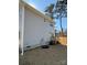 The back exterior view reveals a sliding glass door and wooden fence at 620 Granite Ave, Gastonia, NC 28052