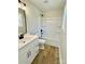 Bathroom featuring a single sink vanity, black hardware, and a shower-tub combination at 620 Granite Ave, Gastonia, NC 28052
