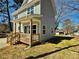 View of the side of the home showcasing the light blue exterior at 620 Granite Ave, Gastonia, NC 28052