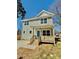 Charming two-story home with a light blue exterior and inviting front porch at 620 Granite Ave, Gastonia, NC 28052