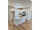 Open kitchen with large center island, white cabinets, and modern appliances at 620 Granite Ave, Gastonia, NC 28052