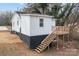 Exterior view of home with a wooden deck and stairs at 621 E Sharpe St, Statesville, NC 28677