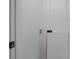 A white-walled laundry room with a hookup for washer and dryer at 621 E Sharpe St, Statesville, NC 28677