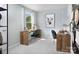 Charming office featuring two wooden desks, elegant chairs, and a window with a view at 7216 Hodges Meadow Ln, Charlotte, NC 28213