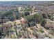 Picturesque golf course view with tree-lined fairways, and adjacent homes for a luxurious lifestyle at 8082 Golf Course N Dr, Denver, NC 28037
