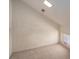 Cozy attic bedroom with natural light, carpeted floor, and window at 8082 Golf Course N Dr, Denver, NC 28037