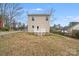 Rear exterior of home featuring large backyard and rear deck at 834 N Flint St, Lincolnton, NC 28092