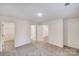Spacious bedroom with neutral carpet and multiple doorways at 834 N Flint St, Lincolnton, NC 28092