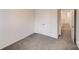 Bedroom featuring neutral paint, carpeting and a double closet with bi-fold doors at 834 N Flint St, Lincolnton, NC 28092