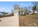 Exterior of home featuring front yard, driveway and attached garage at 834 N Flint St, Lincolnton, NC 28092