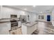 Bright kitchen with granite counters, stainless steel appliances, and an island at 834 N Flint St, Lincolnton, NC 28092