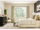 Inviting bedroom features a neutral color scheme, comfortable bed, and ample natural light at 8421 Norman Forest Rd, Lancaster, SC 29720