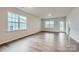 Bright and airy living room featuring hardwood floors and plenty of natural light at 8421 Norman Forest Rd, Lancaster, SC 29720