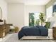 Comfortable bedroom featuring a sliding glass door, stylish decor, and ample natural light at 8426 Norman Forest Rd, Lancaster, SC 29720