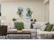 Bright living room with a comfortable sectional sofa, stylish pillows, and contemporary artwork on the wall at 8426 Norman Forest Rd, Lancaster, SC 29720