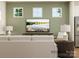 Inviting living room with comfortable seating, stylish lamps, and a large flat-screen TV at 8426 Norman Forest Rd, Lancaster, SC 29720