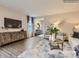 Open-concept living area featuring modern furnishings, elegant decor, and ample natural light, ideal for comfortable living at 8436 Norman Forest Rd, Lancaster, SC 29720