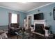 Inviting living room with a classic fireplace, comfortable seating, and tasteful décor at 1001 N Cannon Blvd, Kannapolis, NC 28083