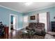 Comfortable living room with hardwood floors, stylish furniture, and lots of light at 1001 N Cannon Blvd, Kannapolis, NC 28083