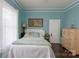 This main bedroom features charming decor and tranquil lighting to create a serene and inviting space at 1001 N Cannon Blvd, Kannapolis, NC 28083