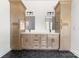 Bathroom features a double vanity, quartz counters, and hexagon tile floors at 1037 Dameron Rd, Bessemer City, NC 28016