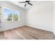 Bright bedroom with a ceiling fan and a large window at 1037 Dameron Rd, Bessemer City, NC 28016