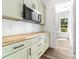Modern kitchen has light green cabinets and drawers with black handles at 1037 Dameron Rd, Bessemer City, NC 28016