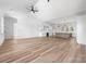 Spacious living area with wood-look flooring, white walls, and an open floor plan at 1037 Dameron Rd, Bessemer City, NC 28016