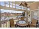 Balcony view with outdoor seating overlooking a serene lake at 107 Pier 33 Dr # 103, Mooresville, NC 28117
