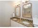Bathroom featuring double sinks, granite countertops, and modern fixtures at 107 Pier 33 Dr # 103, Mooresville, NC 28117