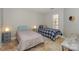 Cozy bedroom showcasing two twin beds and bright natural lighting at 107 Pier 33 Dr # 103, Mooresville, NC 28117