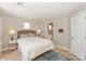Inviting bedroom with natural light, calming colors, and stylish décor at 107 Pier 33 Dr # 103, Mooresville, NC 28117