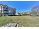 Building exterior featuring multiple floors and a lake view at 107 Pier 33 Dr # 103, Mooresville, NC 28117