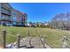 Building exterior featuring multiple floors and a lake view at 107 Pier 33 Dr # 103, Mooresville, NC 28117