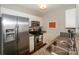 Charming kitchen featuring stainless steel appliances and granite countertops at 107 Pier 33 Dr # 103, Mooresville, NC 28117