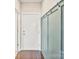 Hallway features custom wall trim with coat hooks at 107 W Poindexter Dr, Charlotte, NC 28203