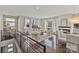 Bright living room with a fireplace, large windows, hardwood floors and lots of natural light at 107 W Poindexter Dr, Charlotte, NC 28203
