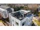 Stunning rooftop deck featuring outdoor seating, dining area, and scenic views, perfect for entertaining and relaxing at 107 W Poindexter Dr, Charlotte, NC 28203