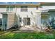 The back of the house has a nice patio with a sliding glass door, outside closet, and green grass at 110 Rhett Ct, Fort Mill, SC 29715