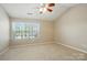 Bedroom with vaulted ceiling, carpet, and natural light at 110 Rhett Ct, Fort Mill, SC 29715