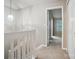 Upstairs hallway features carpet and access to bedrooms at 110 Rhett Ct, Fort Mill, SC 29715