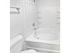 Clean white bathroom featuring a soaking tub and shower combination at 1121 Swearngan Ridge Ct, Charlotte, NC 28216
