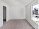 Empty, well lit bedroom, ready to furnish, featuring a sunny window at 1121 Swearngan Ridge Ct, Charlotte, NC 28216