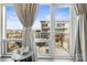 Cozy balcony view with seating, a small table and outdoor residential views at 1133 Metropolitan Ave # 318, Charlotte, NC 28204