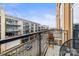 Relaxing outdoor balcony featuring a comfortable seating and a view of the surrounding cityscape at 1133 Metropolitan Ave # 318, Charlotte, NC 28204