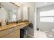 Bright bathroom features a granite countertop, modern vanity, and ample storage at 1133 Metropolitan Ave # 318, Charlotte, NC 28204