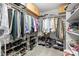 Organized walk-in closet with shelving, rods, and ample storage space at 1133 Metropolitan Ave # 318, Charlotte, NC 28204